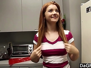 Redheaded teen gives arbitrary blowjob