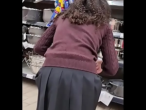 Spying legal age teenager girl at supermarket - short skirt