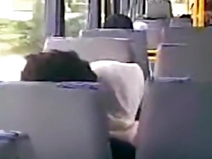 Voyeur tapes an arab hijab girl blowing her bf's horseshit in a public motor coach